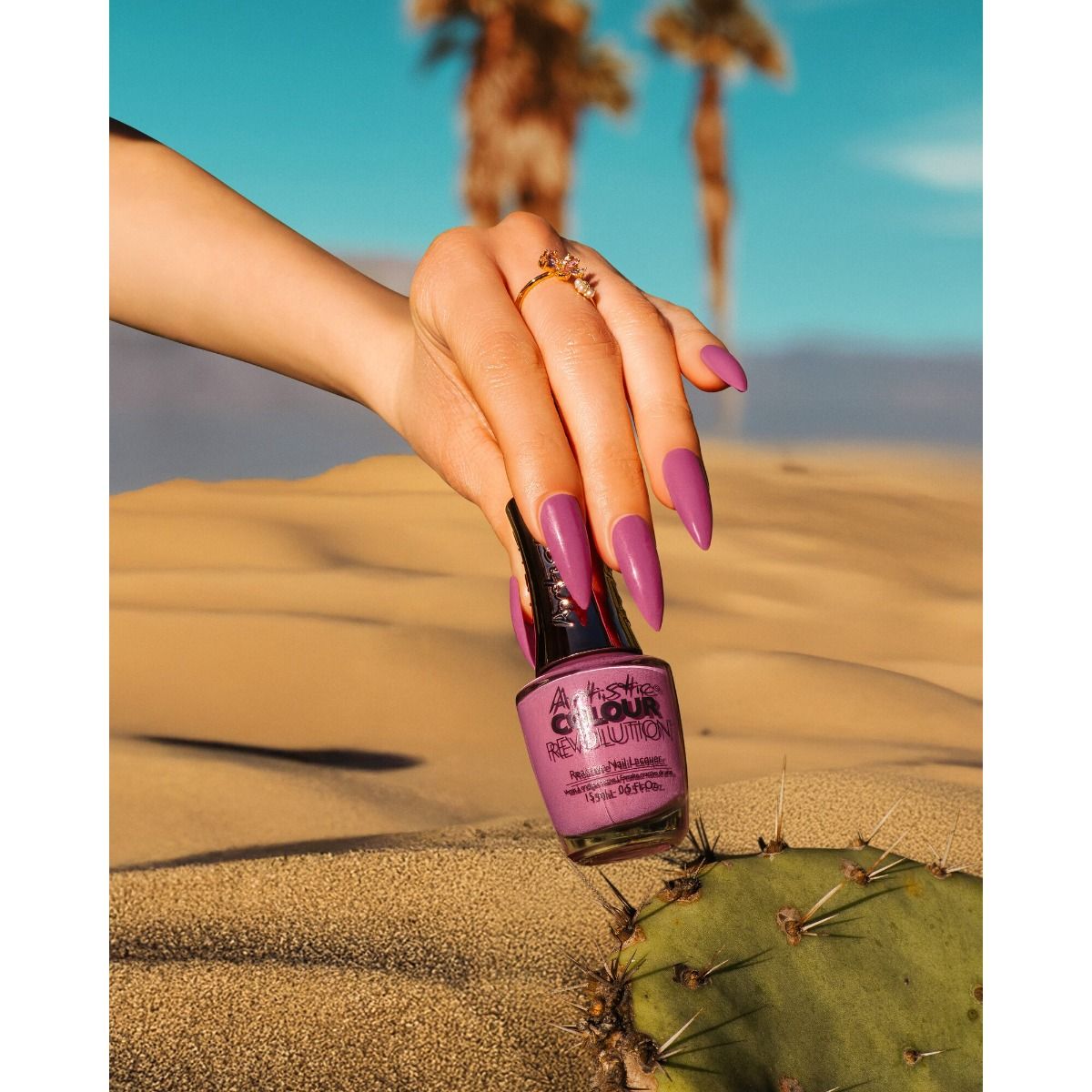 Artistic - Spring 2026 - Desert Eclipse - Cactus Flower Child - Hand Shot with Bottle